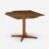 Special-order Pedestal table by George Nakashima, 1965, oak burl, American black walnut, rosewood, sold Feb 2026