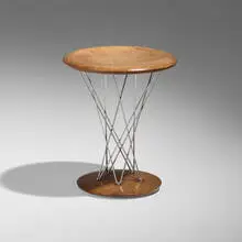 Rocking stool, model 86T by Isamu Noguchi, 1955, walnut, chrome-plated steel, sold Feb 2026