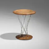 Rocking stool, model 86T by Isamu Noguchi, 1955, walnut, chrome-plated steel, sold Feb 2026