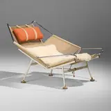 Hans J. Wegner, Early Flag Halyard lounge chair, c. 1960, matte chrome-plated steel, painted steel, flag line, sheepskin, leather, canvas, stained wood