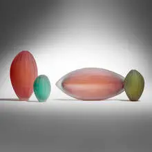 Four vases from the Papaya series by Laura de Santillana, 1995, hand-blown and cold-worked glass, sold Feb 2026