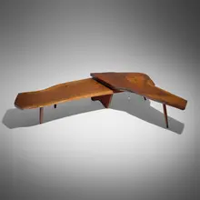 Exceptional special-order Slab coffee table by George Nakashima, 1958, American black walnut, rosewood, sold Feb 2026