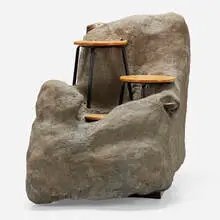 Vito Acconci, Overstuffed Chair, 1987, cement over leather-upholstered lounge chair, stools, steel