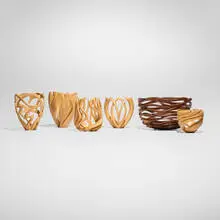 Collection of six vessels by Nikolai Ossipov, c. 2000, boxwood, walnut, sold Aug 2025
