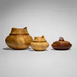 Michael Mode, Collection of three covered vessels, 1987-91, silver maple burl, box elder burl, bubinga, walnut, quartz