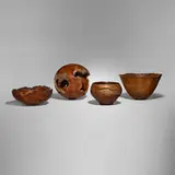 Collection of four works by Joe Dickey, Steve Cohen, David Rechel and Bob Harris, unidentified burl wood, grass tree, Manzanita burl, cherry burl, sold Aug 2025