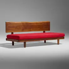 Daybed with Back by George Nakashima, 1959, American black walnut, upholstery, sold Feb 2026