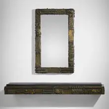Paul Evans, Sculpted Bronze mirror and wall shelf, 1973, bronzed resin over wood, mirrored glass, slate
