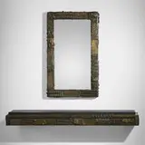 Paul Evans, Sculpted Bronze mirror and wall shelf, 1973, bronzed resin over wood, mirrored glass, slate