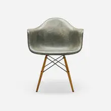 DAW by Charles and Ray Eames, 1951, molded fiberglass with rope edge, birch, enameled steel, sold Feb 2026