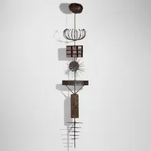 Early wall sculpture by Paul Evans, c. 1960, torch-cut, welded and patinated steel, sold May 2025