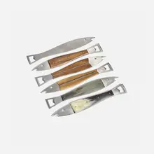Carl Auböck III, Bottle openers model 4687, set of six, c. 1955, stainless steel, leather, rosewood, resin