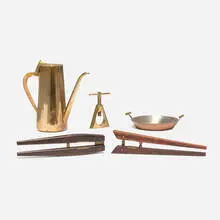 Collection of five tabletop accessories by Carl Auböck, c. 1948-1955, brass, rosewood, copper, cane, sold Jan 2026
