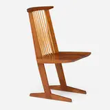 Conoid chair by George Nakashima, 1984, American black walnut, hickory, sold May 2025