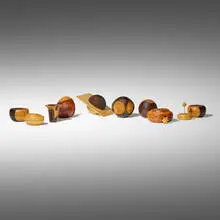 Collection of eleven boxes by Hans Weissflog, African blackwood, amboyna burl, boxwood, purpleheart, maple, sold Apr 2025