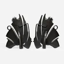 Andirons, pair by Albert Paley, 1996, forged and fabricated steel with a blackened finish, sold Apr 2025