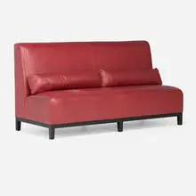 Custom settee by Christian Liaigre, c. 2000, leather upholstery, stained wood, sold Jan 2026