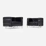 Lounge chairs, pair by Charlotte Perriand, Pierre Jeanneret, and Le Corbusier, c. 1990, leather, chrome-plated steel, sold Jan 2026