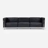 Sofa by Charlotte Perriand, Pierre Jeanneret, and Le Corbusier, c. 1995, leather, chrome-plated steel, sold Jan 2026
