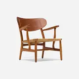 Hans J. Wegner, Lounge chair, model CH22, 1951, teak, paper cord