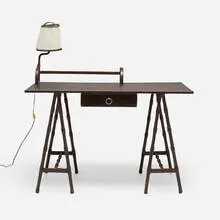 attribution Jacques Adnet, Desk with lamp, c. 1950, saddle-stitched leather over wood and steel, parchment shade, nickel-plated brass