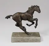 Galoppierendes Fohlen by Renée Sintenis, 1928, Bronze mit brauner Patina, auf grauen Steinsockel montiert. Höhe (ohne Sockel): 12 cm (4 ¾ in.), sold Nov 2014