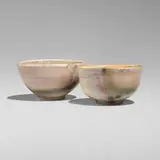 Tea bowls, set of two by Toshiko Takaezu, c. 1995, glazed porcelain, sold Apr 2025