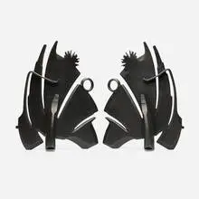 Andirons, pair by Albert Paley, 1996, forged and fabricated steel with a blackened finish, sold Jan 2025