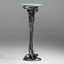 Dragon's Back floor lamp by Albert Paley, 2006, forged and fabricated steel with a blackened finish, frosted glass, sold Jan 2025
