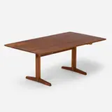 Trestle dining table by George Nakashima, 1972, American black walnut, East Indian laurel, sold Jan 2025