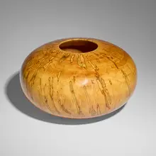 Leopard Maple Globe by Ed Moulthrop, 1985, turned and varnished leopard maple, sold Jan 2025