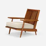 Cushion Chair with Arms by George Nakashima, American black walnut, upholstered cushion, sold Jan 2025