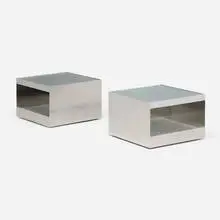 Joseph D'Urso, Low rolling tables model 6022T, pair, 1980, stainless steel, safety glass