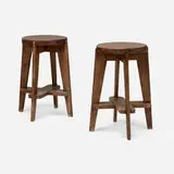 High stools from the Scientific Block, Punjab University, Chandigarh, pair by Pierre Jeanneret, c. 1965-66, teak, sold Dec 2025