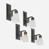 attribution and Daum Marcel Vasseur, Sconces for Ferronnerie d'Art des Galeries Lafayette, Atelier La Maîtrise, France, set of four, c. 1925, patinated wrought iron, glass