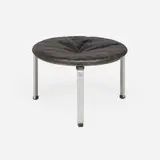 PK33 stool by Poul Kjærholm, 1959, leather upholstery, matte chrome-plated steel, painted wood, plastic, rubber, sold Dec 2025