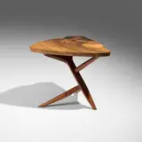 Special-order Conoid Cross-Legged table by George Nakashima, 1986, English walnut, American black walnut, rosewood, sold Dec 2025