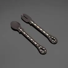 Salad serving set by William Philip Spratling, c. 1964, ebony, sterling silver, sold Dec 2025