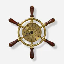 Hermès, Ship's Wheel clock, c. 1950, brass, gilt bronze, oak