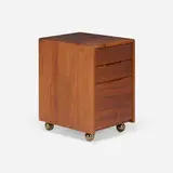 Pedestal by George Nakashima, 1971, American black walnut, casters, sold Sep 2024
