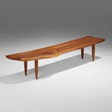 Bench or coffee table by Phillip Lloyd Powell, c. 1965, American black walnut, sold Sep 2024