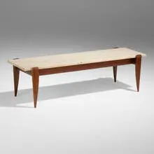 Coffee table by Gio Ponti, c. 1957, travertine, walnut, sold Sep 2024