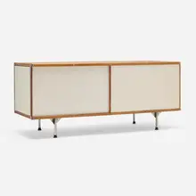 Charles and Ray Eames, ESU 100-C, walnut plywood, chrome-plated steel, lacquered Masonite, fiberglass
