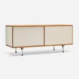 Charles and Ray Eames, ESU 100-C, walnut plywood, chrome-plated steel, lacquered Masonite, fiberglass