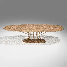 Ofidia center table by Fernando and Humberto Campana, c. 2015, cast and gilt bronze, sold Dec 2025