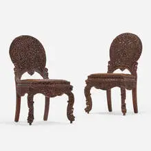 Burmese, Carved side chairs, pair, walnut, leather
