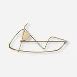Pin by Claire Falkenstein, c. 1965, brass wire, carved bead, sold Mar 2024