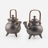 Jean Marais, Teapots, pair, c. 1965, high temperature glazed ceramic, rattan