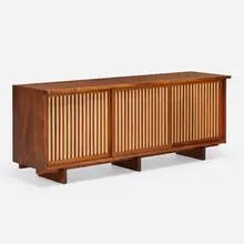 George Nakashima, Special-order Triple Sliding Door cabinet, 1976, American black walnut, pandanus cloth