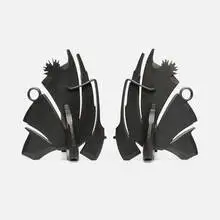 Andirons, pair by Albert Paley, 1996, forged and fabricated steel with a blackened finish, sold Sep 2024
